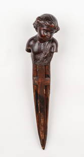 19th C. European Carved Wood Figural Vampire Slayer Stake: 19th Century European Carved Wood Figural Vampire Slayer Stake. Carved putto handle. Size: 19.5'' x 4.5'' x 4.5'' (50 x 11 x 11 cm). Provenance: Ex. VAMPA Vampire & Paranormal Museum Collection, NJ;