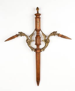 Large Antique Vampire Slayer Bronze Mounted Stake: Large Antique European Vampire Slayer Bronze Mounted Stake. Carved wooden stake with bronze knop, flanking winged dragons, and inset with small crucifix. Size: 30'' x 25'' x 2'' (76 x 64 x 5 cm).