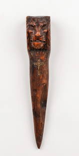 19th C. European Vampire Slayer Stake: 19th Century European Vampire Slayer Stake. With carved face of a lion and small inset crucifix. Size: 15.5'' x 2.75'' x 4'' (39 x 7 x 10 cm). Provenance: Ex. VAMPA Vampire & Paranormal Museum