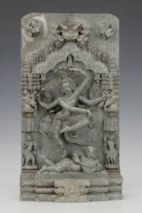 Indian Stone Carving of Shiva Doing the Tandava: Indian stone carving of Shiva doing the Tandava, while surrounded by consorts and other Hindu Deities. Very detailed carving and in excellent condition. Size: 19.5'' x 10.25'' x 5'' (50 x 26 x 13 cm).