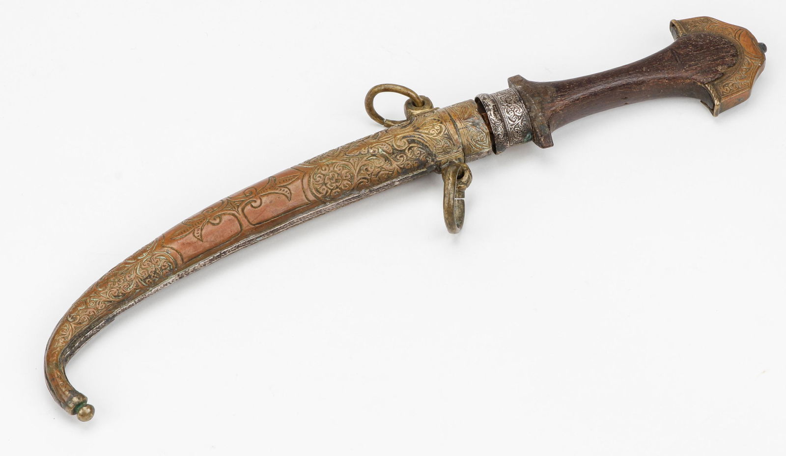 Antique Jambiya with 10" Blade: Antique Jambiya with 10" Blade. From the collection of Joseph Salamanca. Size: 16'' x 2.5'' x 5'' (41 x 6 x 13 cm).