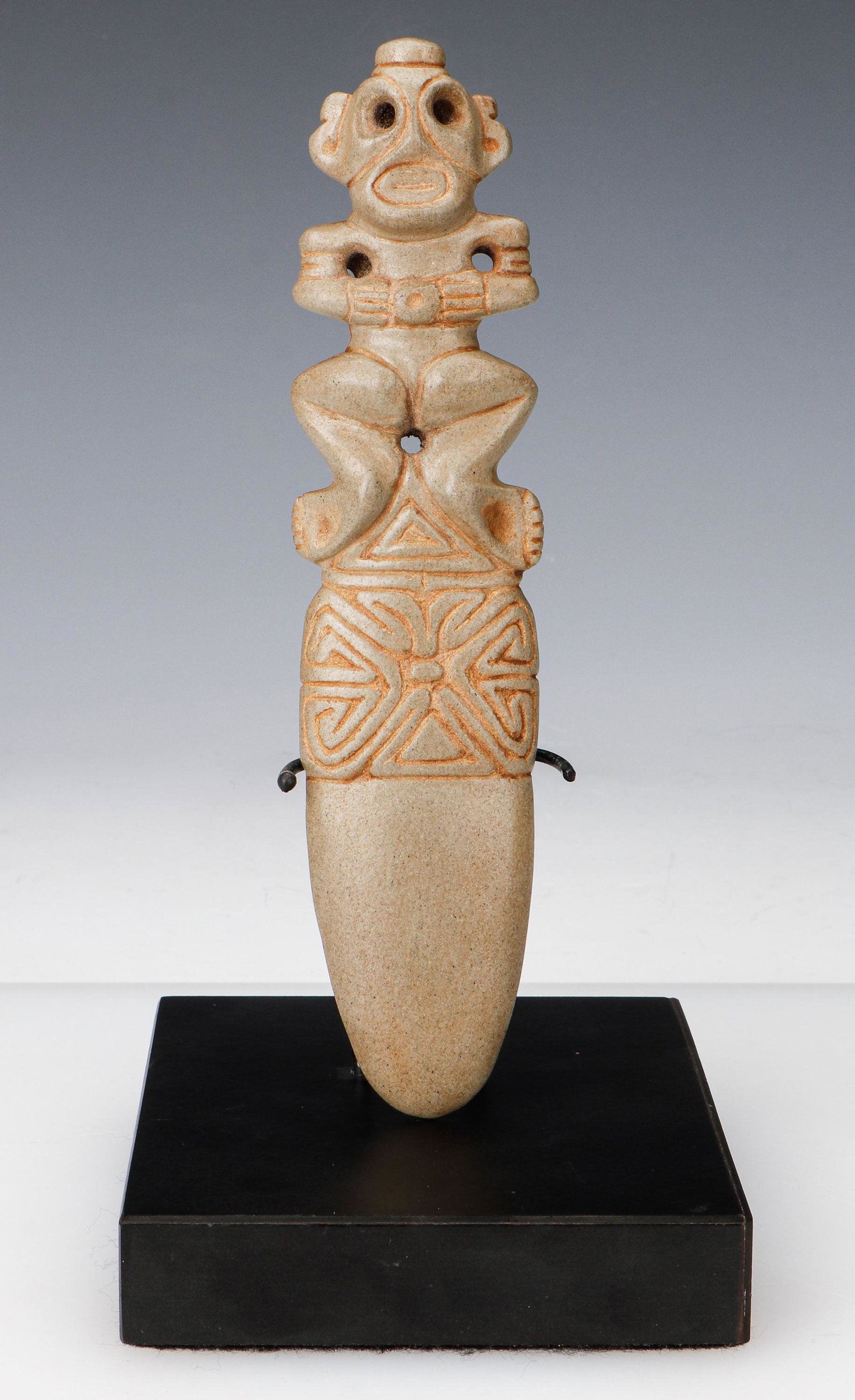 Taino Pre-Columbian Full Figure Anthropic Spatulate Form: Taino Pre-Columbian Full Figure Anthropic Spatulate Form, possibly for purging prior to taking cohoba. Pierced eyes. Hands hold a medallion like object. The legs resemble those of a frog . A abstract 