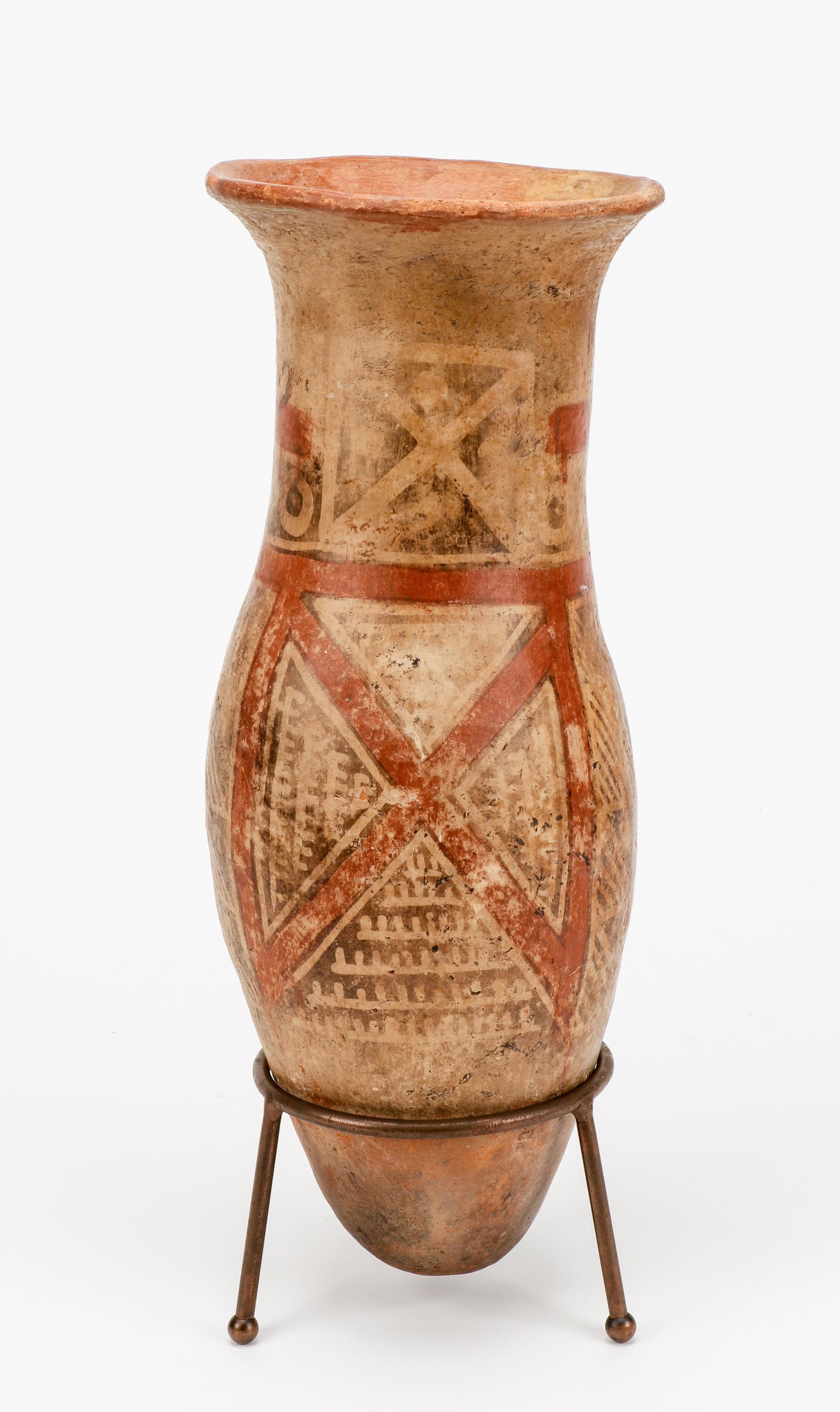Pre-Columbian Quillacinga Tall Polychrome Pottery Vessel: Pre-Columbian Quillacinga Tall Polychrome Pottery Vessel. On stand. Provenance: Clavia Arte Indigena - Precolombinos, Bogata, Colombia, 1987. Size: 22'' x 9'' x 9'' (56 x 23 x 23 cm). Height on stand:
