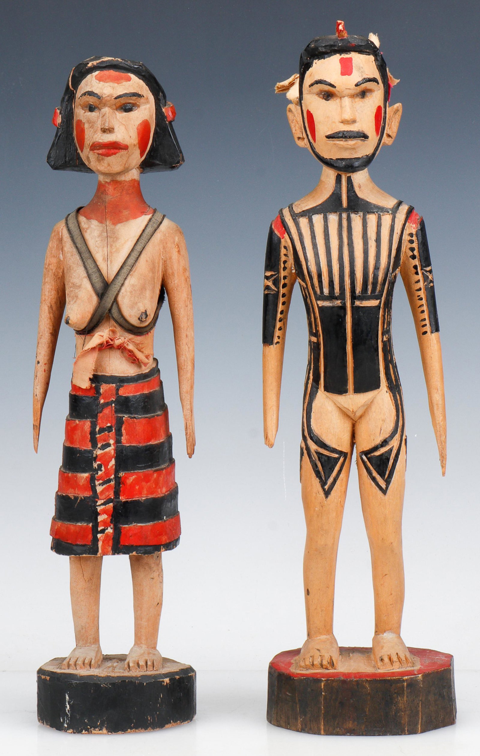 Yap Island Male and Female Figures, Caroline Islands: Yap Island Male and Female Figures, Caroline Islands.Carved wood and pigment. From the collection of Joseph Salamanca. Size: 1) 16'' x 4'' x 4'' (41 x 10 x 10 cm); 2) 17'' x 4.25'' x 4'' (43 x 11 x 10