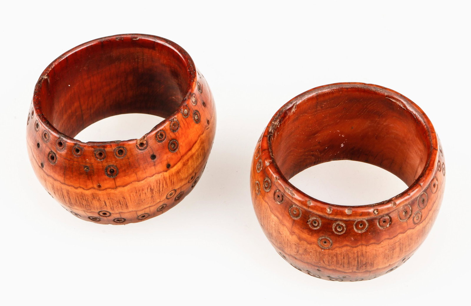 2 Dowry Bangles, Sumba, Indonesia, 19th C.: 2 Dowry Bangles, Sumba, Indonesia, 19th C. Solid, etched bone bracelets that were part of the bride's marriage trousseau. Provenance: Ex. Seth Hersh/Batikat Collection. Size: 1) 1.5'' x 2.75'' x 3'' (
