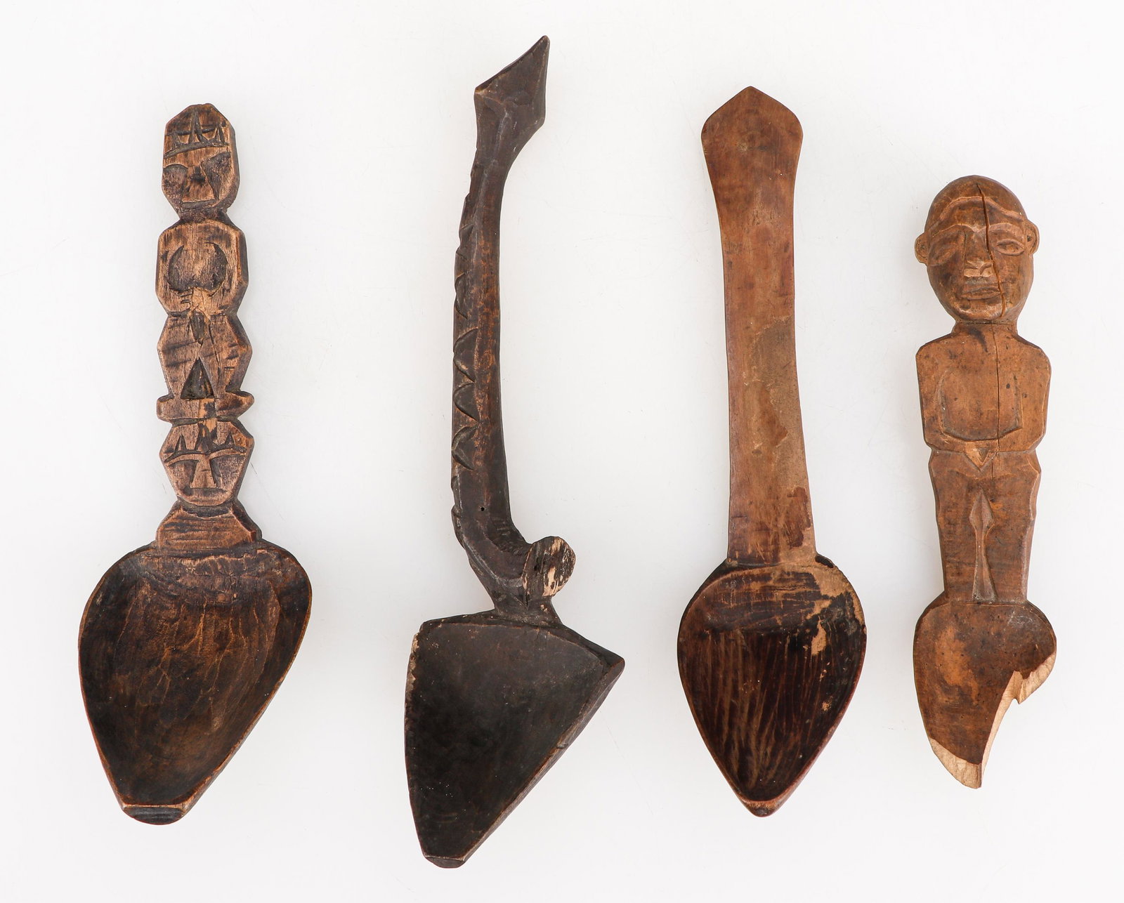 Four Paiwan Spoons, Taiwan.: Four Paiwan Spoons, Taiwan. Size: Ranging from: 7.5'' x 1.5'' x 1.25'' (19 x 4 x 3 cm) to 9.5'' x 2.5'' x .75'' (24 x 6 x 2 cm).