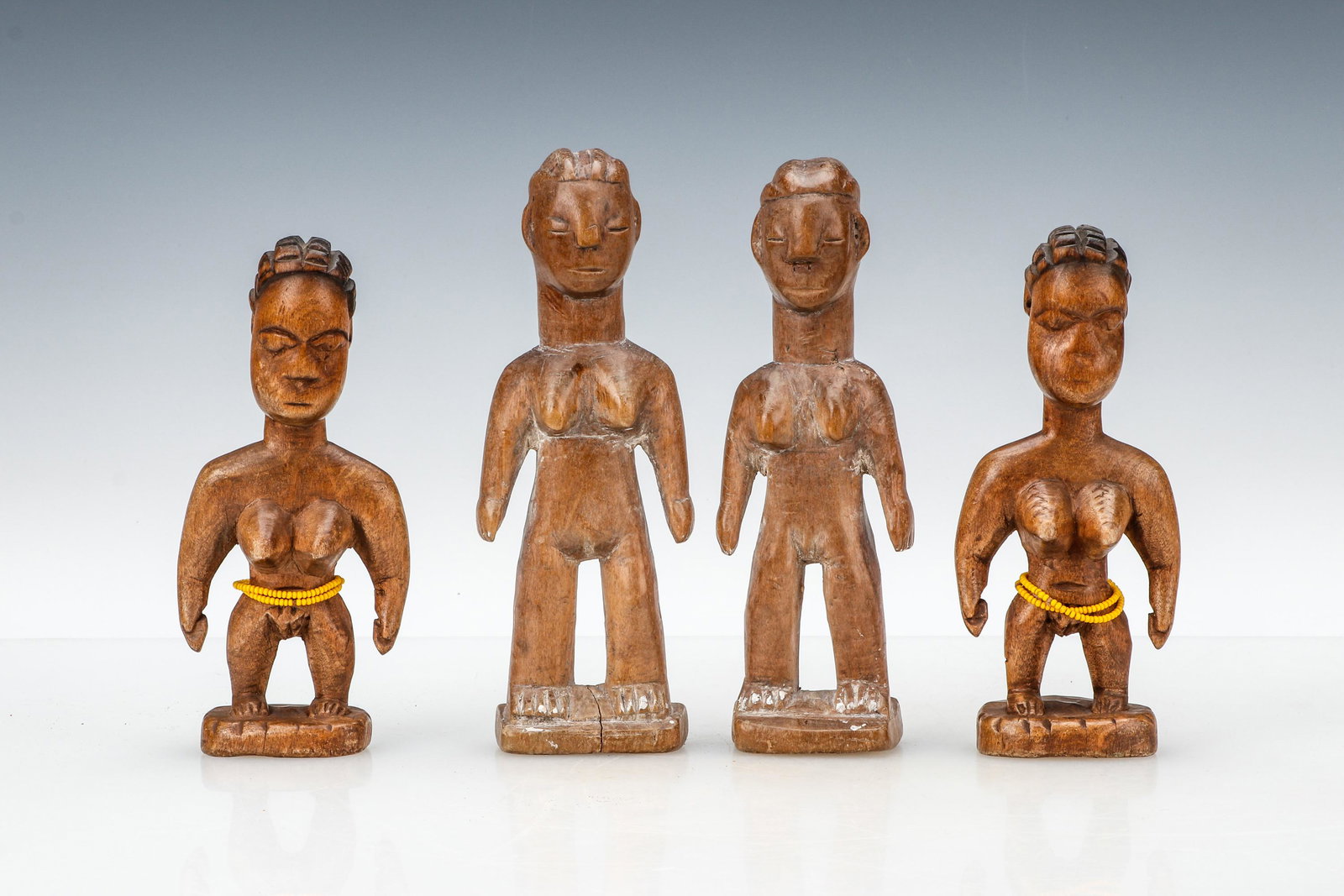 2 African Fon Sets of Twins: 2 African Fon Sets of Twins. Ranging in size from: 6.25'' x 2.5'' x 1.5'' (16 x 6 x 4 cm) to 7'' x 2'' x 1.75'' (18 x 5 x 4 cm).