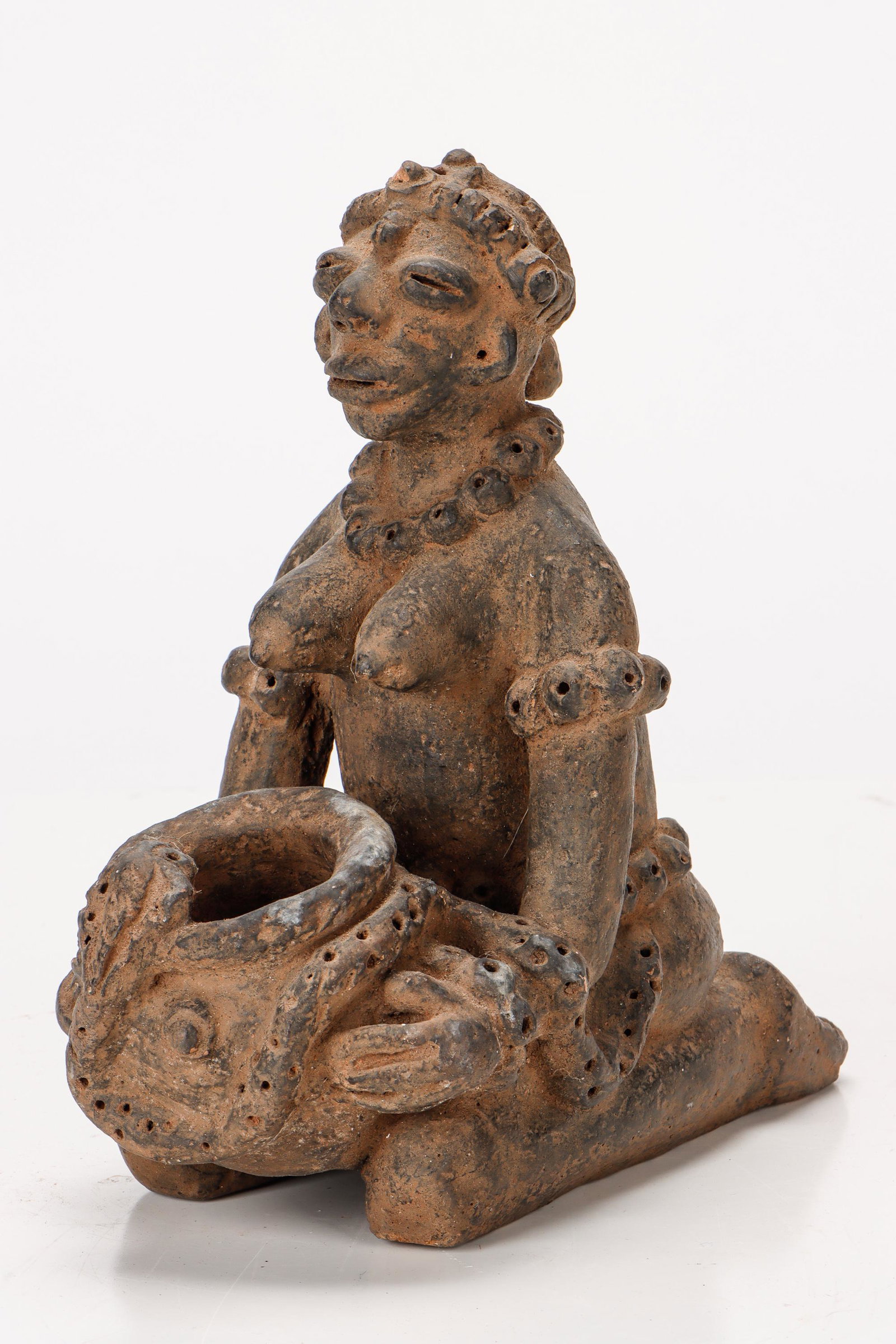 African Yoruba Clay Figure of a Kneeling Woman with Bowl: African Yoruba Clay Figure of a Kneeling Woman with Bowl. Size: 9'' x 5'' x 8.25'' (23 x 13 x 21 cm).