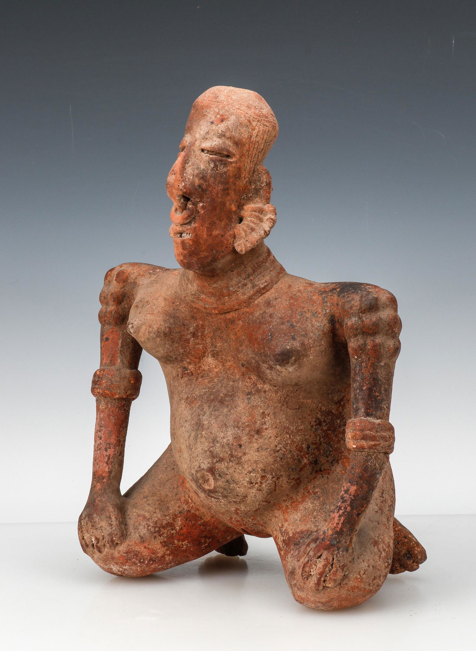 Fine Pre-Columbian Nayarit Pottery Maternity Figure: Fine Pre-Columbian Nayarit Pottery Maternity Figure. Size: 14'' x 10'' x 5.5'' (36 x 25 x 14 cm). Ex. estate collection of Diana and Lawrence Fane.