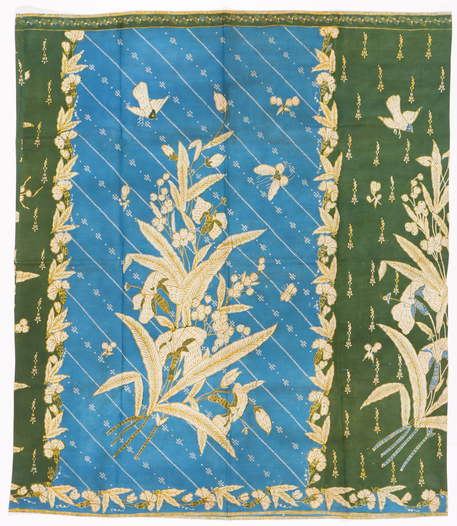 Indo-European Tulis Sarong, Indonesia, 1930s-1940s.: Indo-European Tulis Sarong, Indonesia, 1930s-1940s. The choice of lilies in the bouquet makes this sarong strongly European in taste. Hand-stitched repairs about 2 inches near top of main body. No oth