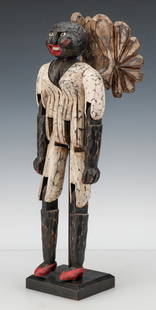 Shane Campbell (American, 20th c.): Shane Campbell (American, 20th c.) Black Folk Art Angel "Ruby", carved and painted wood articulated sculpture, on stand. Size: 14.5'' x 5.5'' x 5.5'' (37 x 14 x 14 cm); height on stand: 16". Acquired