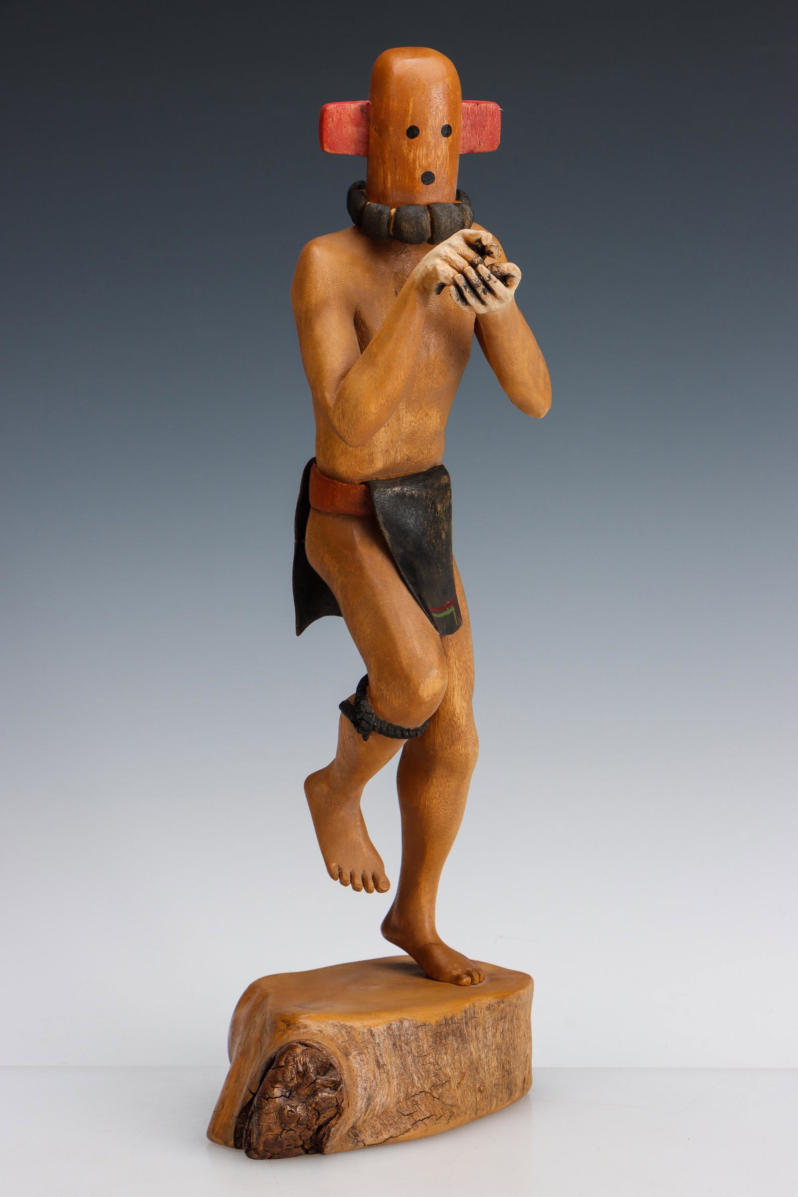 Michael Dean Jenkins (aka Dean Michaels) (b.1959): Michael Dean Jenkins (aka Dean Michaels) (b.1959) "Choqapolo" Hand-Carved and Painted wood Kachina sculpture. Note: Repairs. Size: 14.5'' x 5.5'' x 3'' (37 x 14 x 8 cm).
