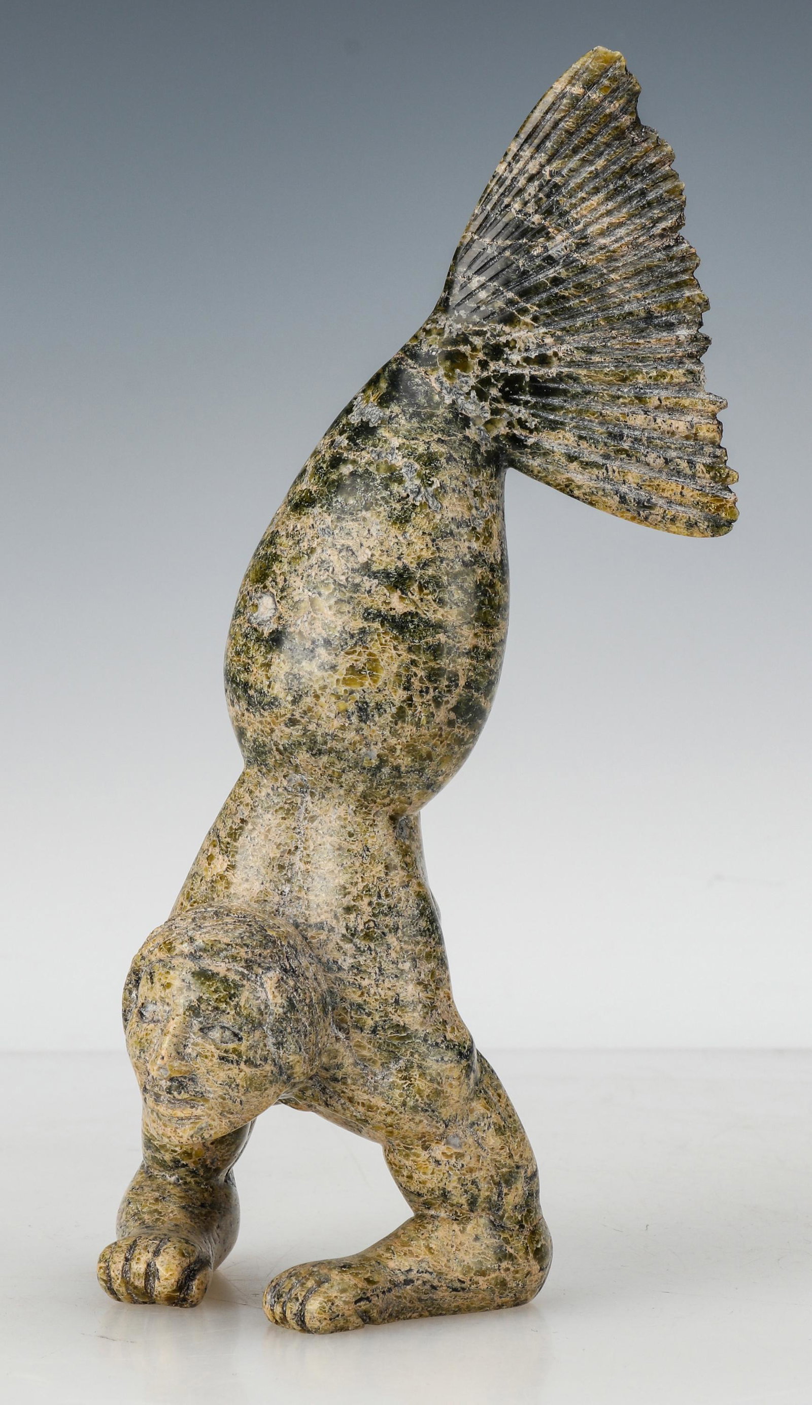 Isacie Etidloie (Inuit, 1972-2014, Kinngait, Cape Dorset: Isacie Etidloie (Inuit, 1972-2014, Kinngait, Cape Dorset. Sedna (Male), carved stone. Size: 8'' x 3'' x 3'' (20 x 8 x 8 cm). From Bay of Spirits Gallery, Toronto, Ontario. The Murphy-Godinez Collectio
