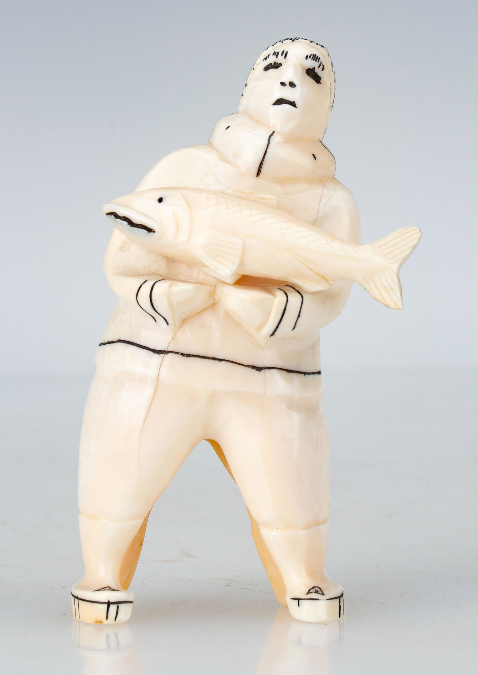 Antique Inuit Carving of a Man with a Fish (1 of 5)
