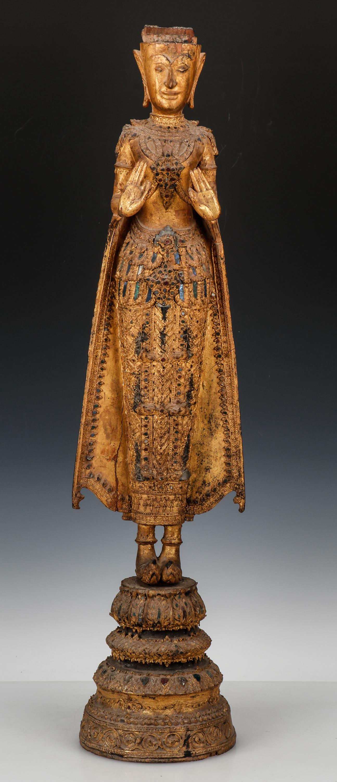 Antique Thai Giltwood Figure, Ht. 34'': Antique Thai Giltwood Figure. Believed to have been acquired in Thailand around 1980. Size: 34'' x 8.5'' x 7.5'' (87 x 22 x 19 cm). Exhibition Location: Oakwell Estate, 1835 County Line Rd., Villanova