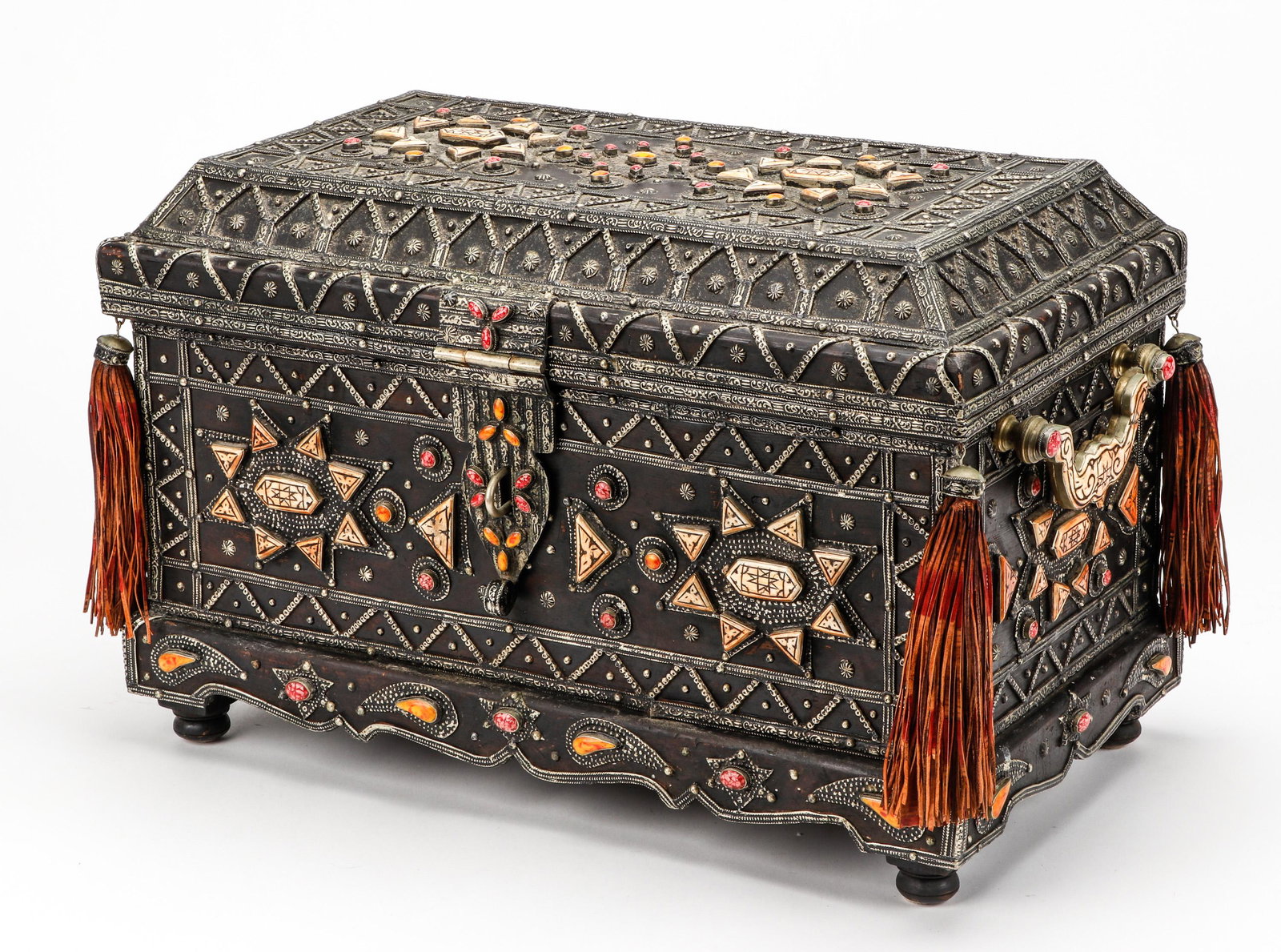 Antique Moroccan Chest with Leather Tassels: Antique Moroccan Chest with Leather Tassels. Painted leather interior. Size: 13.5'' x 20.5'' x 11.5'' (34 x 52 x 29 cm). Exhibition and Post-Auction Pickup Location: Material Culture, 4700 Wissahickon
