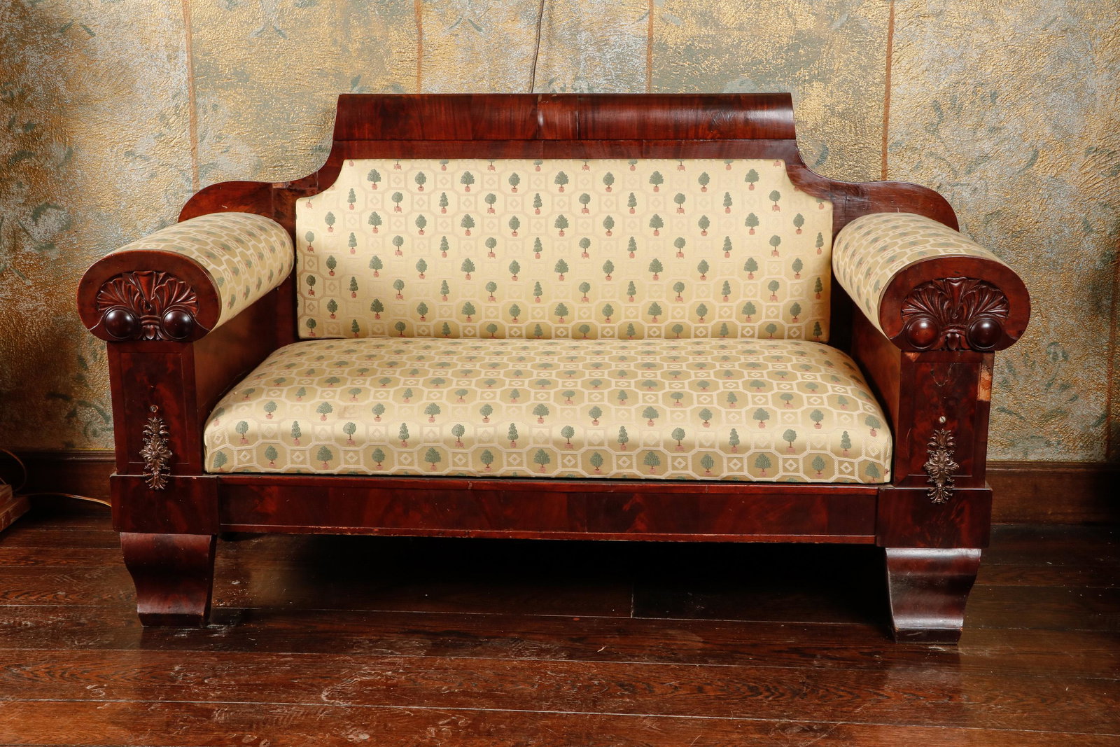 Empire Carved Mahogany and Veneered Sofa: Empire Carved Mahogany and Veneered Sofa. Ormolu decoration. Size: 34'' x 60'' x 23'' (86 x 152 x 58 cm). Exhibition and Post-Auction Pickup Location: Oakwell Estate, 1835 County Line Rd., Villanova,