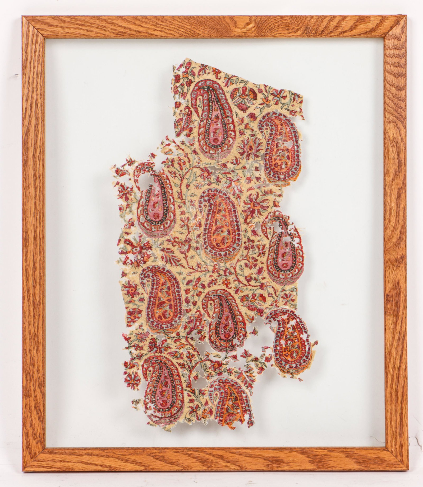 Framed 18th C. Kashmir Textile Fragment: Framed 18th C. Kashmir Textile Fragment. A carefully framed (under glass) fragment of a Kashmir textile, with diagonal boteh forms on an ivory field. Size: 16'' x 8'', 41 x 20 cm (textile); 19.25'' x