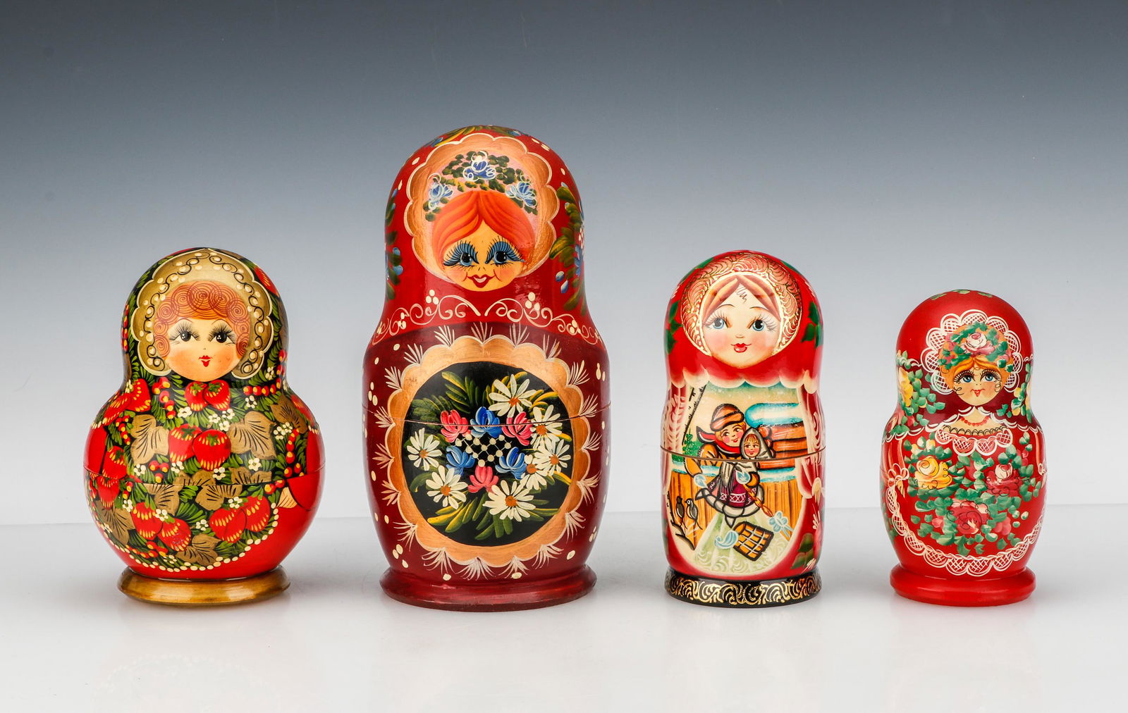 4 Sets of Russian Matryoshka Nesting Dolls: 4 Sets of Russian Matryoshka Nesting Dolls. Size: Tallest ranging from 6.5'' (17 cm) to 10'' (25 cm).