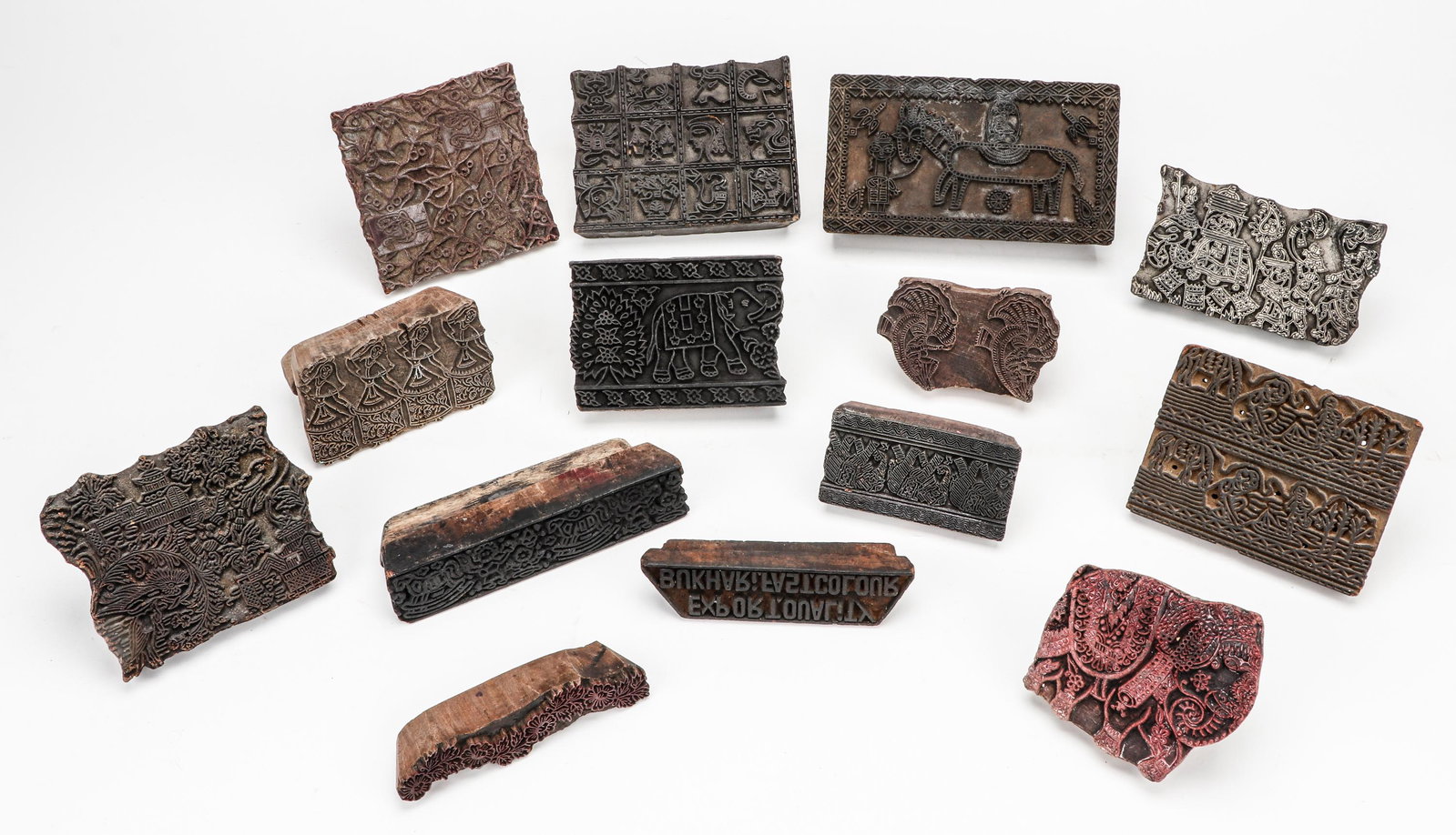Lot of Fourteen Woodblocks, India/Pakistan, 19th or early 20th C.: Lot of Fourteen Woodblocks, India/Pakistan, 19th or early 20th C. Size: Range from 1.75'' x 6.5'' x 1.5'' (4 x 17 x 4 cm) to Size: 3.5'' x 9'' x 5'' (9 x 23 x 13 cm).