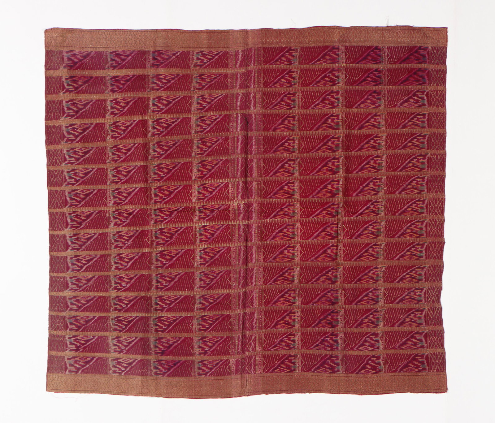 Rare Silk Ikat And Gold Thread Songket Textile: Rare Silk Ikat And Gold Thread Songket Textile, Indonesia, 19th-early 20th C. Size: 42.5'' x 38.5'', 108 x 98 cm.