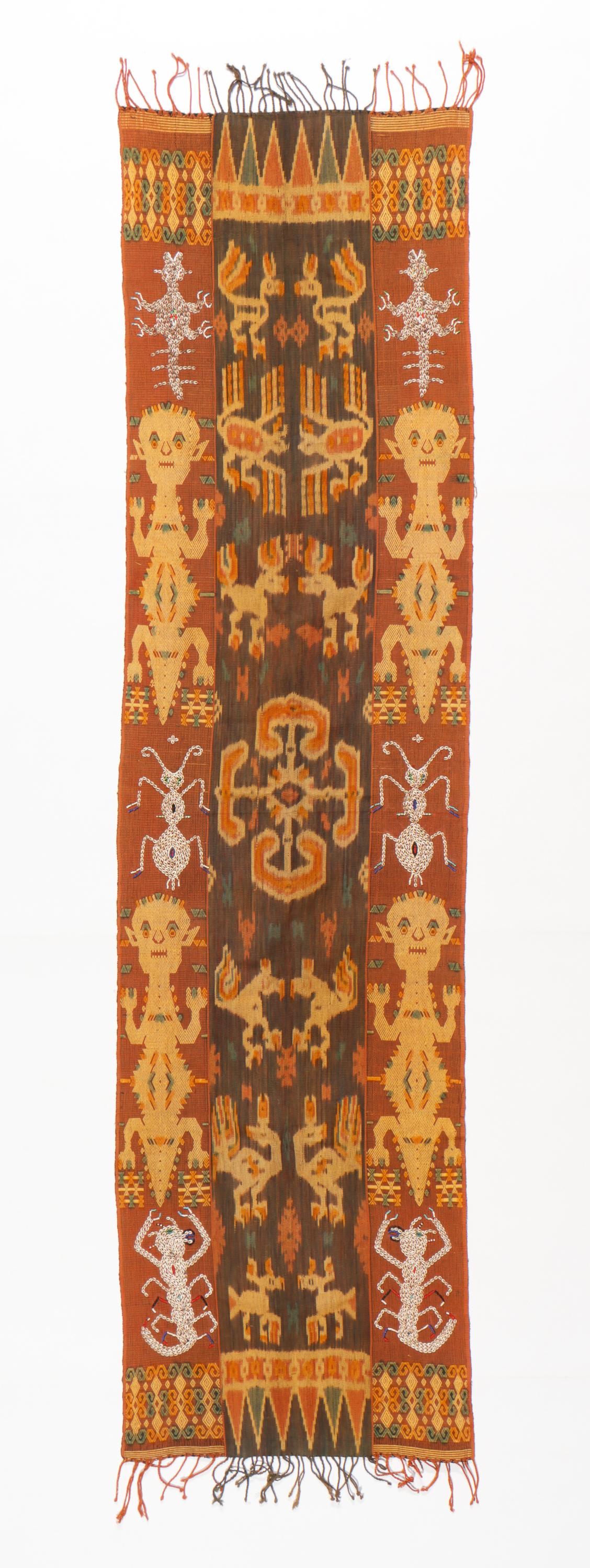 Sumba Ikat Panel Bordered By Panels With Shell And Supplementary Weaving Designs: Sumba Ikat Panel Bordered By Panels With Shell And Supplementary Weaving Designs, Indonesia, Mid 20th C. Size: 92'' x 23.5'', 234 x 60 cm.
