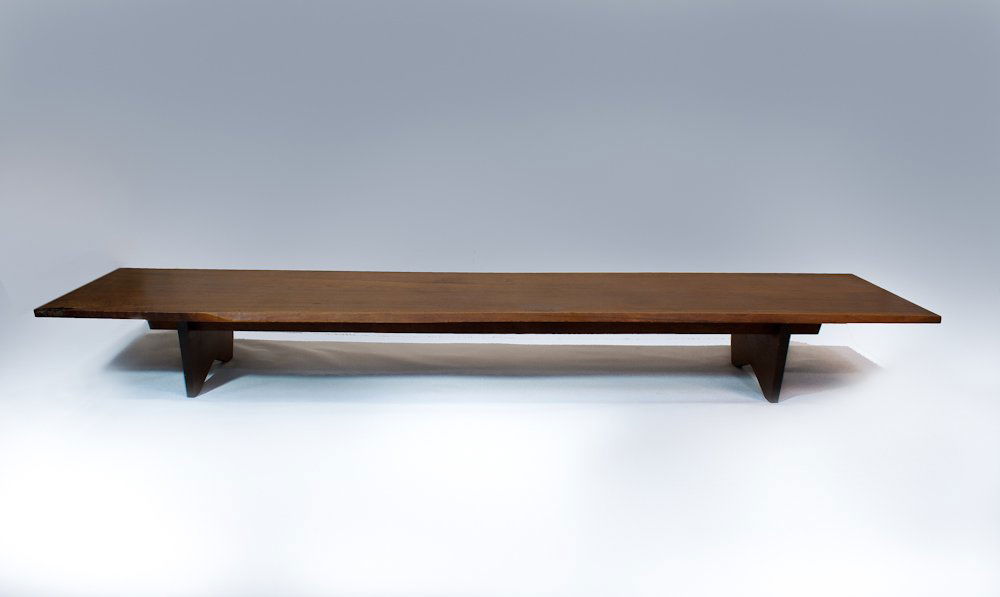 George Nakashima: American (1905-1990); Long Free Edge Walnut Coffee Table; Length: 106” Width: 27” Height: 12”; Provenance: Moderne Gallery