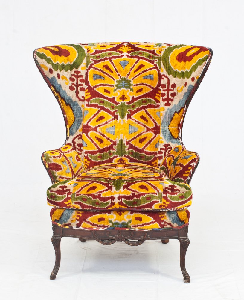 Antique Wingback Armchair In Silk Velvet Ikat: Re-Upholstered in Silk Velvet Ikat. Height: 44” Width: 37”