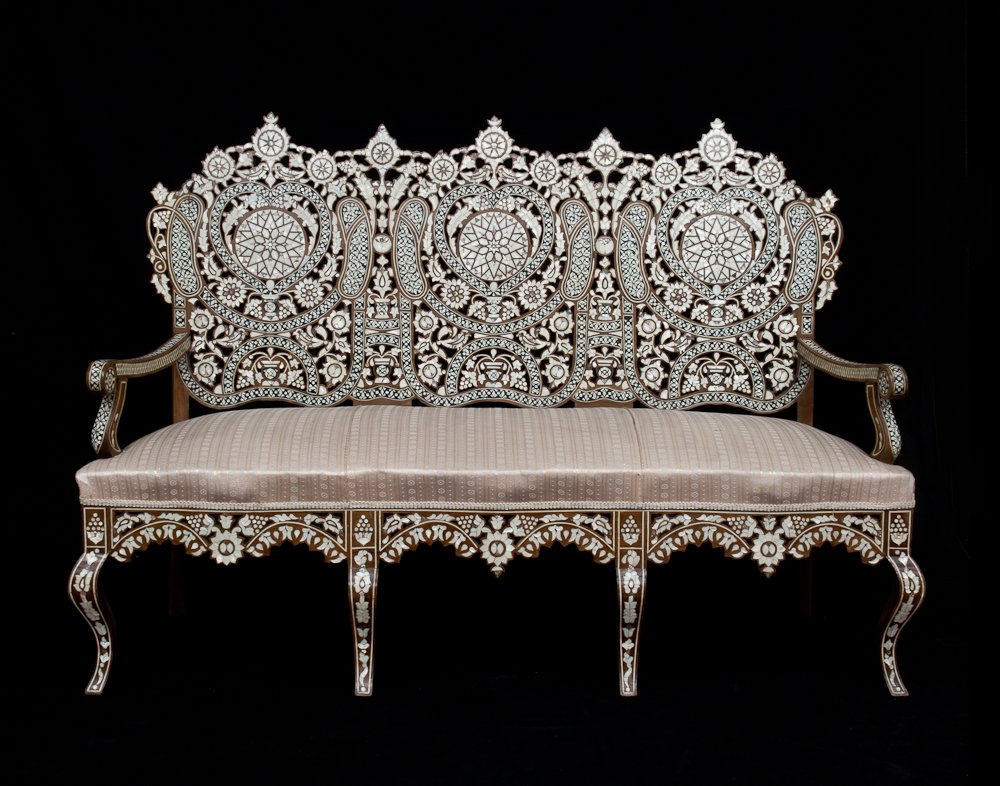 A Syrian Mother-Of-Pearl Sofa: Mother of Pearl and Bone inlaid. Height: 50” Width: 72” Depth: 28”