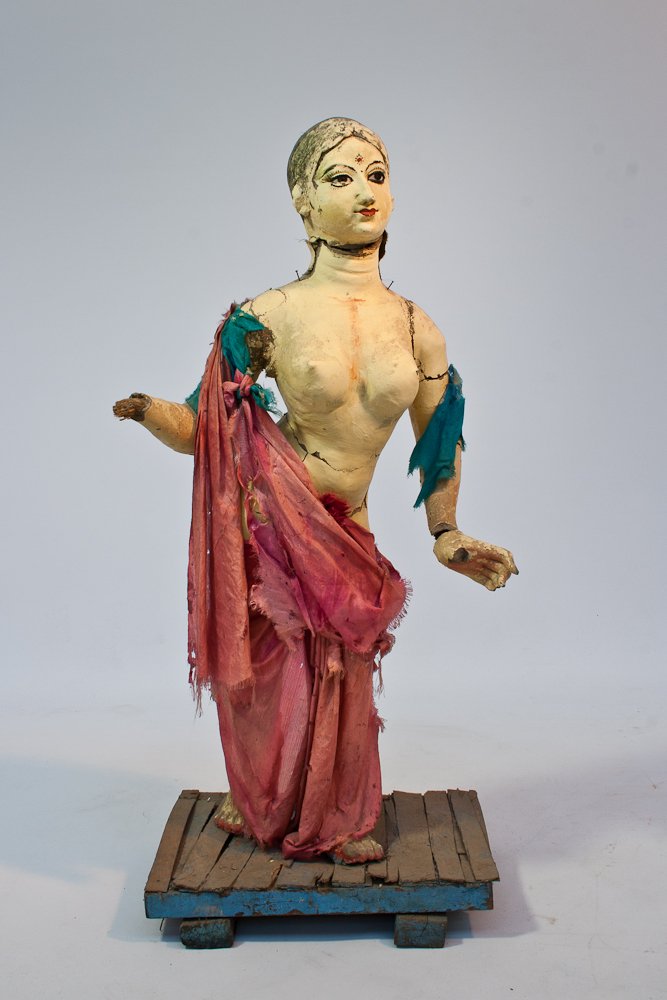 Temple Figure: India, 19th century, wood, straw, clay, painted decoration, very fragile, requires careful shipping. Height: 31 ½”