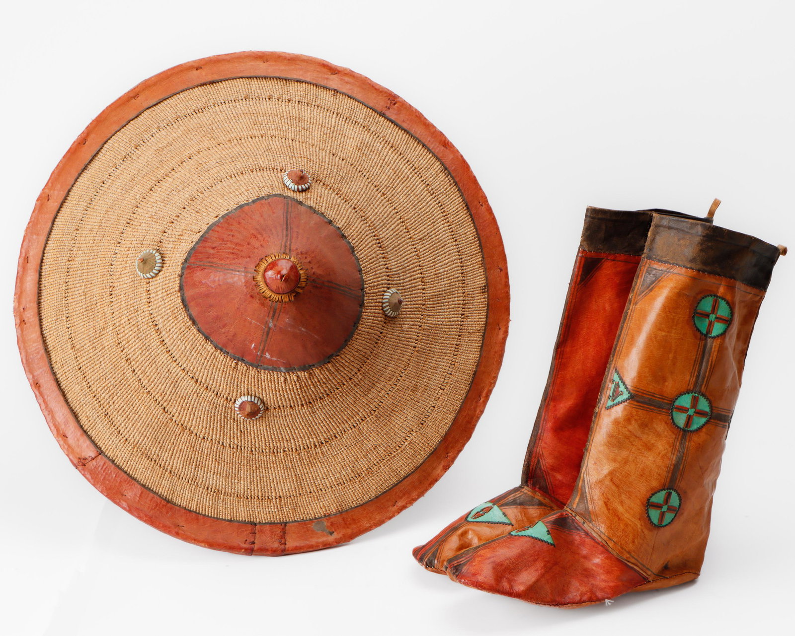 African Hausa Leather Riding Boots and Fulani Hat, Nigeria: African Hausa Leather Riding Boots and Fulani Hat, Nigeria. Size: Hat: 23'' x 23'' x 8'' (58 x 58 x 20 cm); boots: 16'' x 15'' x 4'' (41 x 38 x 10 cm).