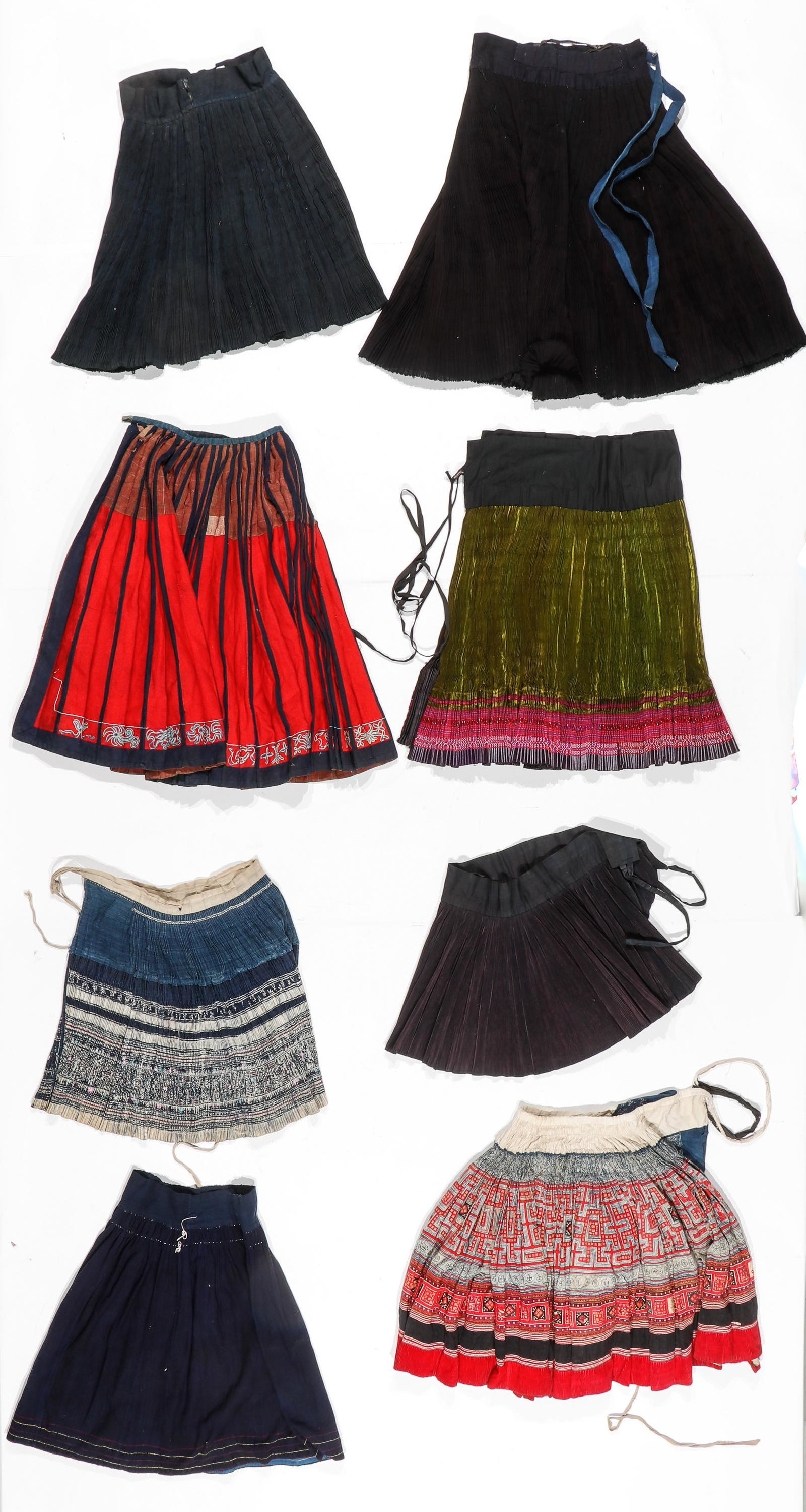 Collectors lot of Eight Miao Skirts, 19th and 20th C.: Collectors lot of Eight Miao Skirts, 19th and 20th C. Size: range from 13.5'' x 41'', 34 x 104 cm to 31'' x 28'', 79 x 71 cm (textile).