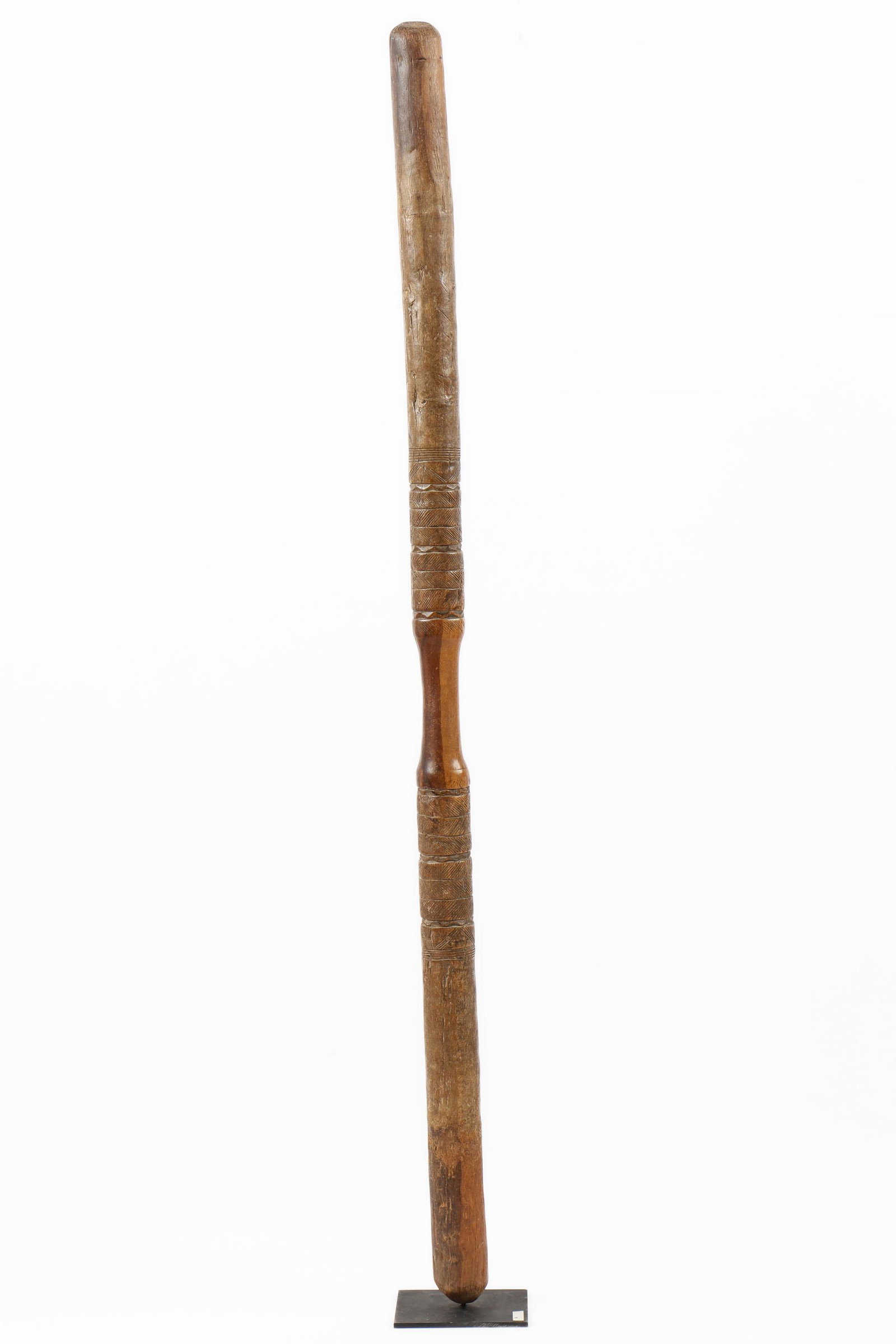 Large African Pestle, Mali: Large African Pestle, Mali. Carved wood. On stand. Size: 56'' x 2'' x 2'' (142 x 5 x 5 cm).