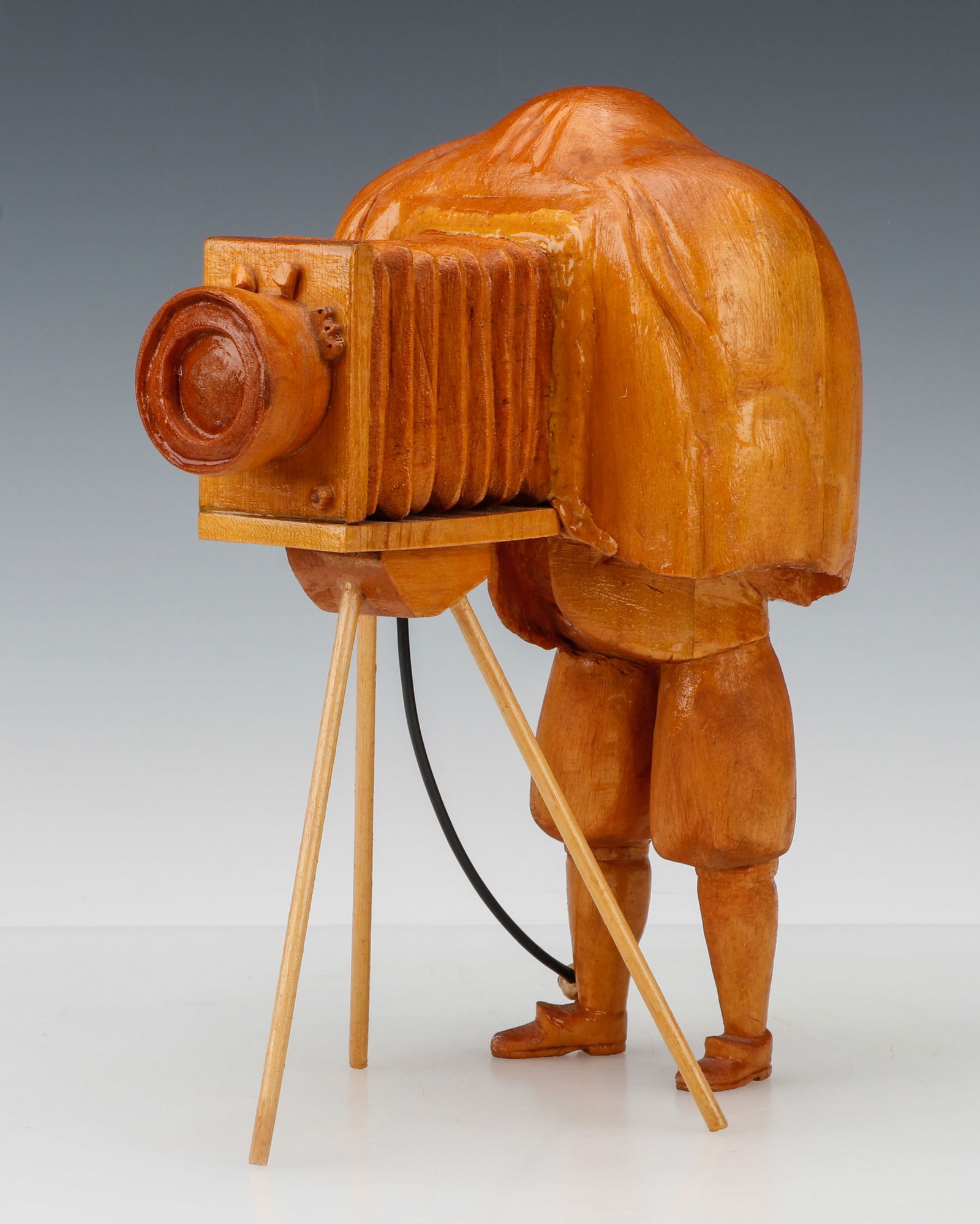 Folk Art Wood Carving of a Photographer (1 of 7)