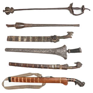 Collectors Lot of Indonesian Kris Daggers, Mace and Club: Collectors Lot of Indonesian Kris Daggers, Mace and Club. Size: ranging from 24'' x 3'' x 2.5'' (61 x 8 x 6 cm) to 31'' x 5'' x 3.5'' (79 x 13 x 9 cm).