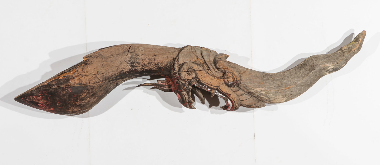 Burmese or Thai Naga Dragon: Burmese or Thai Naga Dragon. Carved wood and pigment. Size: length 5'0'' (152 cm)