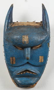 African Chewa Peoples Mask, Malawi: African Chewa Peoples Mask, Malawi. Carved wood and pigment. The devilish face in blue with stylized pointed ears. Property of a New York Collector. Size: 13'' x 7'' x 4.5'' (33 x 18 x 11 cm).