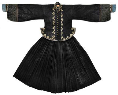 Chinese Zhuang Ceremonial Outfit, Eraly 20th C.: Chinese Zhuang Ceremonial Outfit, Early 20th Century: Cotton, natural indigo-dye. Size: Jacket 22'' x 60'' (56 x 152 cm). Skirt: 31'' x 24'' (79 x 61 cm). This striking ceremonial ensemble hails from