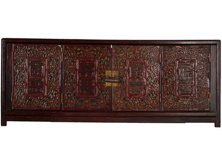 Korean Lacquered Chest or Scholar's Table, 19th C.: Korean Lacquered Chest or Scholars Table, 19th C. With a carved polychromed facade. Size: 13'' x 32'' x 11'' (33 x 81 x 28 cm).