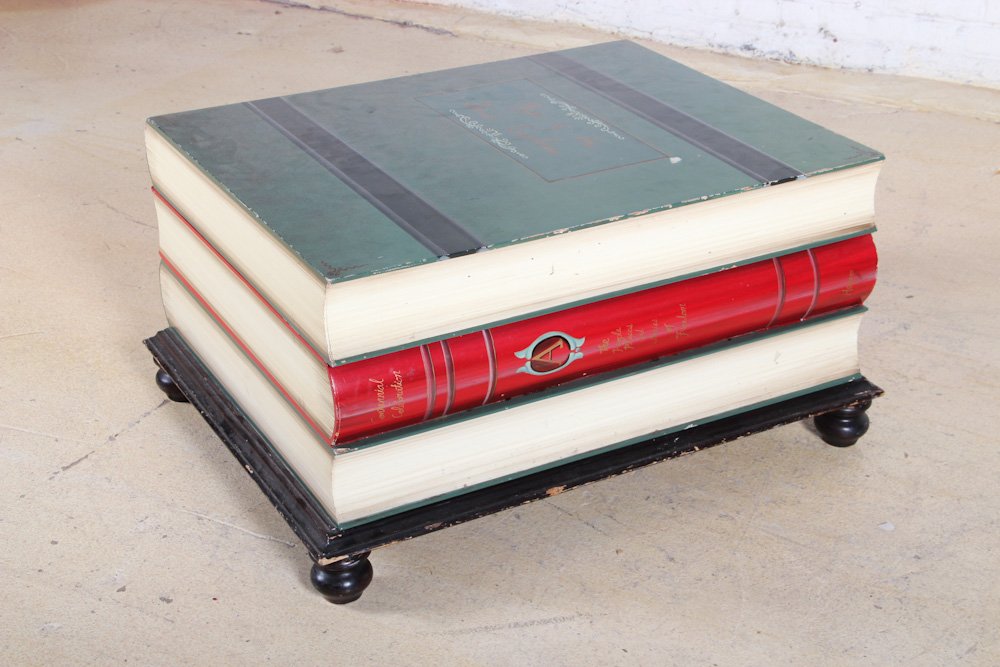 Maps of The Great Explorers Coffee Table: Vintage Coffee Table Shaped like Books with Maps of the Great Explorers, mid 20th c, painted wood. Dimensions: 18 x 33 x 27 inches.