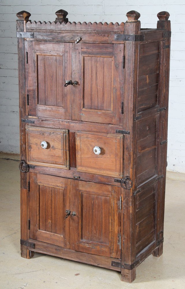 Anglo Indian Tall Cabinet: Anglo Indian Tall Cabinet, circa 1900, teak. Dimensions: 60 x 30 x 19 inches. Property of Michaelian and Kohlberg.