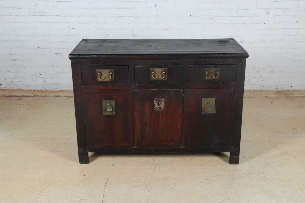 Chinese Sideboard Cabinet: Chinese Sideboard Cabinet, late 19th c, elm, remnants of black lacquer, hardware. Dimensions: 35 x 50 x 22 inches. Property of Michaelian and Kohlberg.