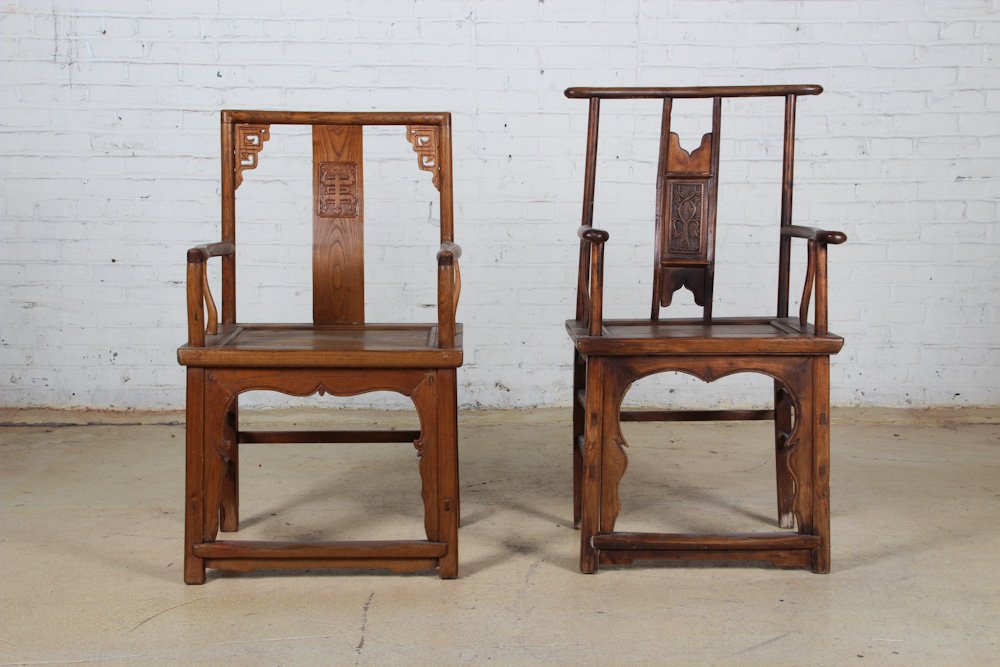 Two Chinese Formal Chairs: Two Chinese Formal Chairs, late 19th c, elm. Dimensions: 42 x 22 x 17 inches (each). Property of Michaelian and Kohlberg.