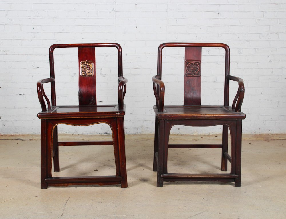 Two Chinese Formal Chairs: Two Chinese Formal Chairs, late 19th c, elm. Dimensions: 38 x 24 x 18 inches (each). Property of Michaelian and Kohlberg.