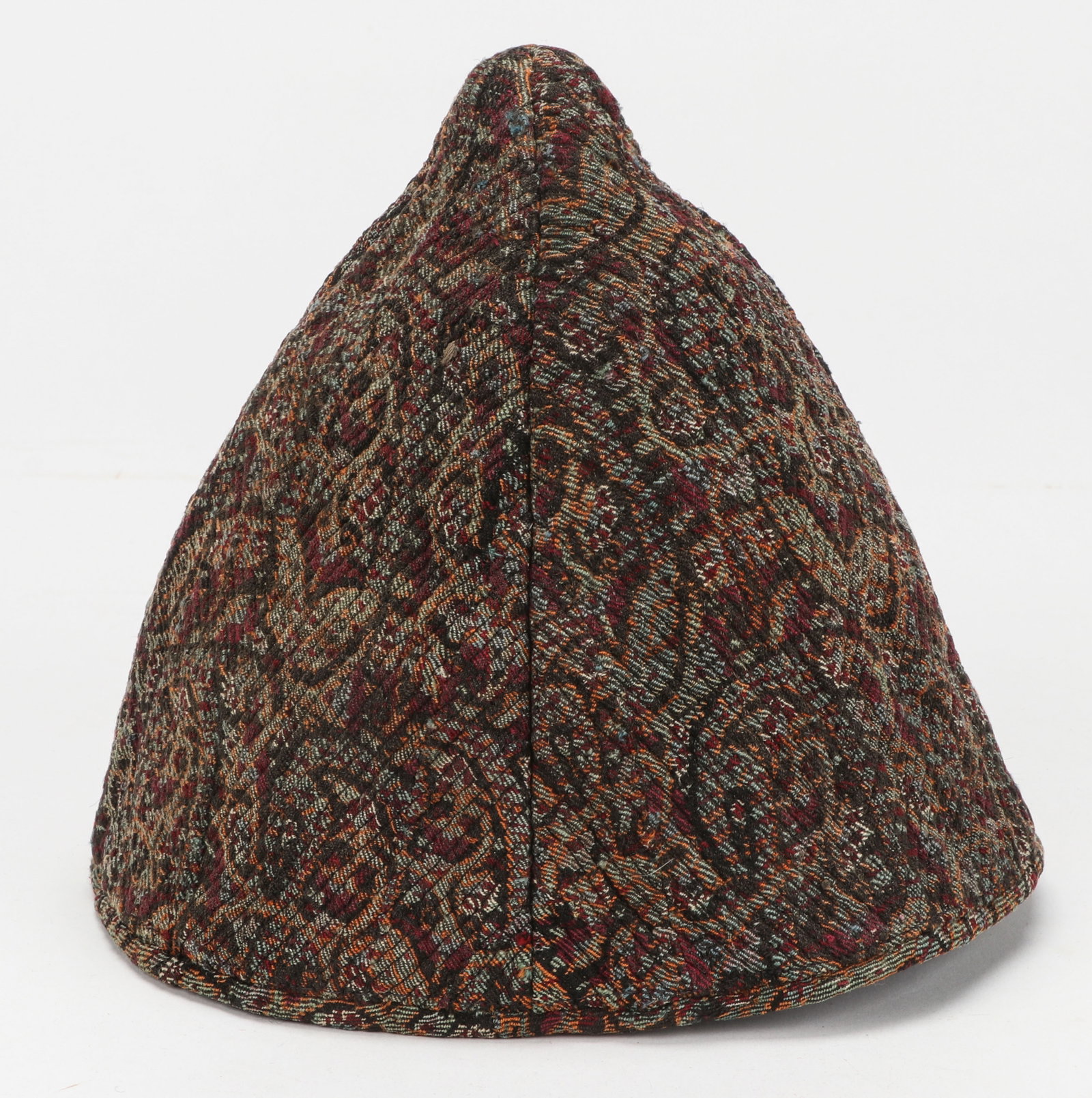 Isfahan or Kerman Dervish Hat, Early 20th C.: Isfahan or Kerman Dervish Hat, Early 20th C. This brocaded dervish hat is believed to have originated in either Isfahan or Kerman. Made from Terme, a wool fabric with brocading, it boasts a rich color