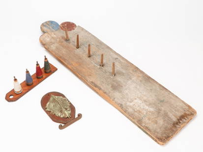 Folk Art Collector's Lot: Folk Art Collector's Lot. Including a ring toss board, thread spools. Size: Ranging from 8.5'' x 5'' x 2'' (22 x 13 x 5 cm) to 38.5'' x 10'' x 4.5'' (98 x 25 x 11 cm). Provenance: The Robert L. Pfanne
