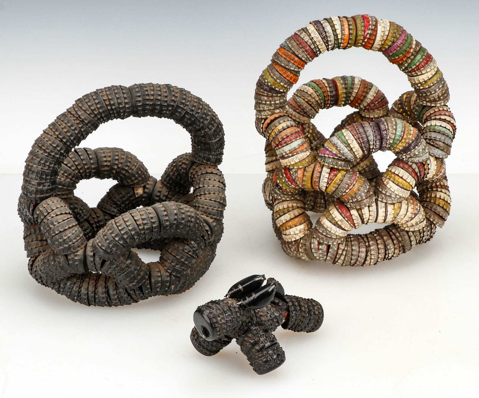 3 Folk Art Bottle Cap Sculptures: 3 Folk Art Bottle Cap Sculptures. Size: ranging from 3'' x 5'' x 4'' (8 x 13 x 10 cm) to 9'' x 8'' x 6'' (23 x 20 x 15 cm). Provenance: The Robert L. Pfannebecker Collection.