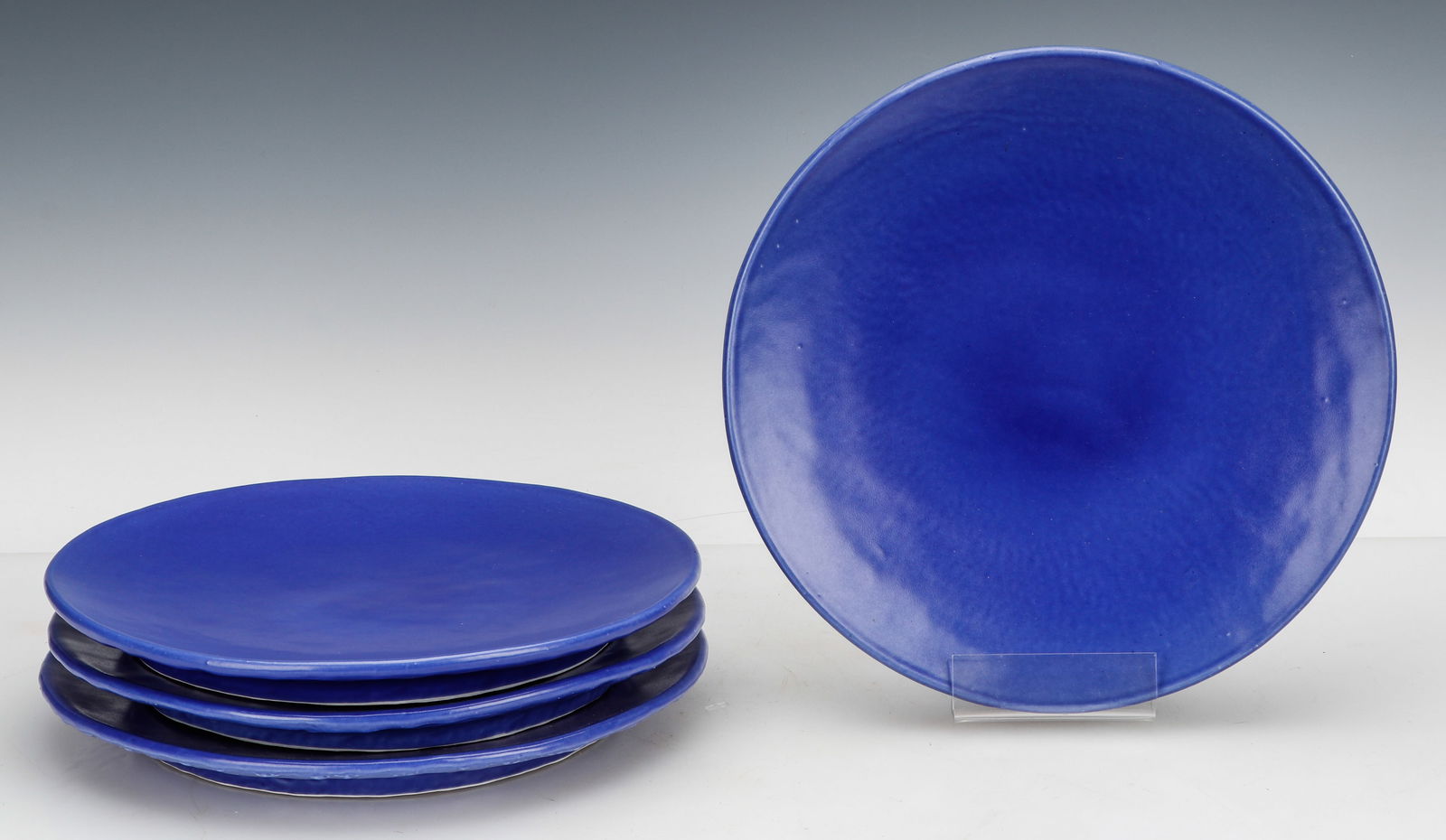 4 Art Pottery Plates: 4 Art Pottery Plates. Size: 1'' x 11.5'' x 11.5'' (3 x 29 x 29 cm). Provenance: The Robert L. Pfannebecker Collection.