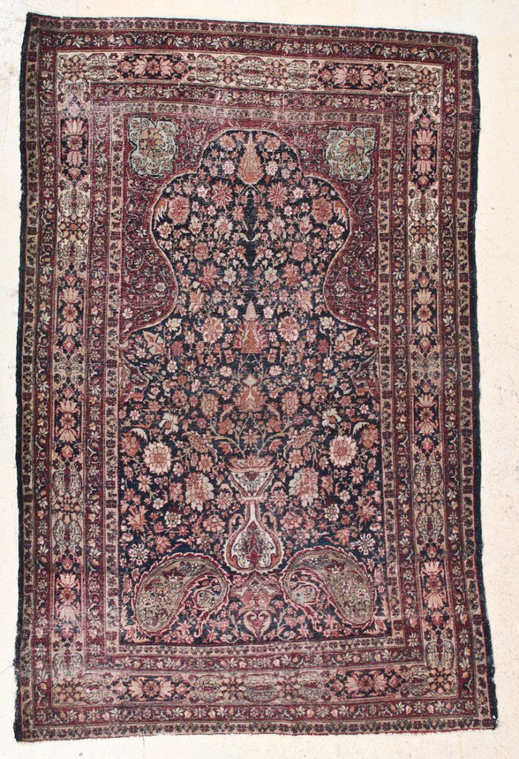 Kerman Prayer Rug: Kerman Prayer Rug, Persia, circa 1900, directional mihrab, areas of wear. Size: 6' 9" x 4' 3". Cost for us to pack and ship this item via UPS GROUND in the continental USA (includes insurance, with si