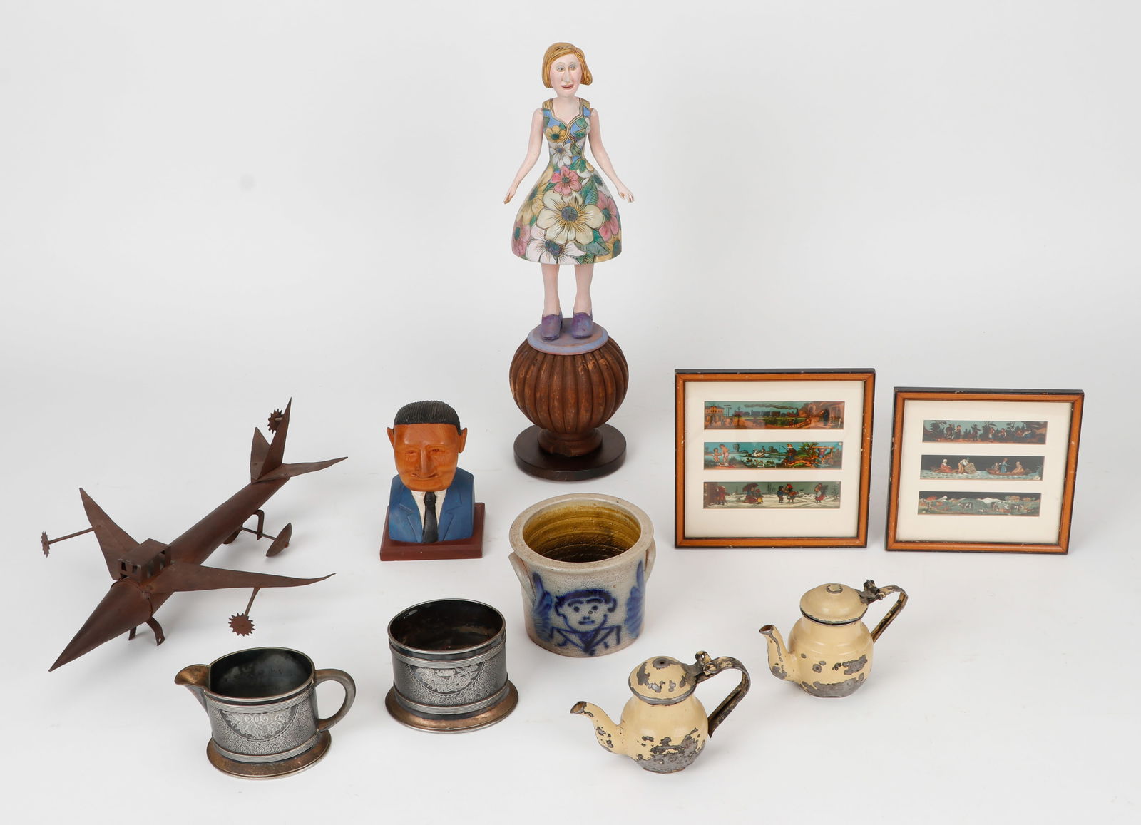 Folk Art Collector's Lot: Folk Art Collector's Lot. Including; pyrography wood figure of a lady in a floral dress, 1996, signed Marcia Sandmeyer Wilson; a wooden bust signed Reisig 1978; a Beaumont Pottery, York, Maine cobalt